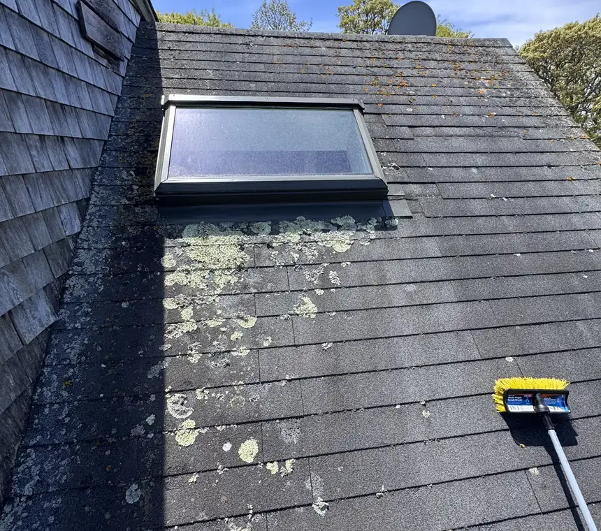 ClearView technician performing professional exterior cleaning service on Martha's Vineyard